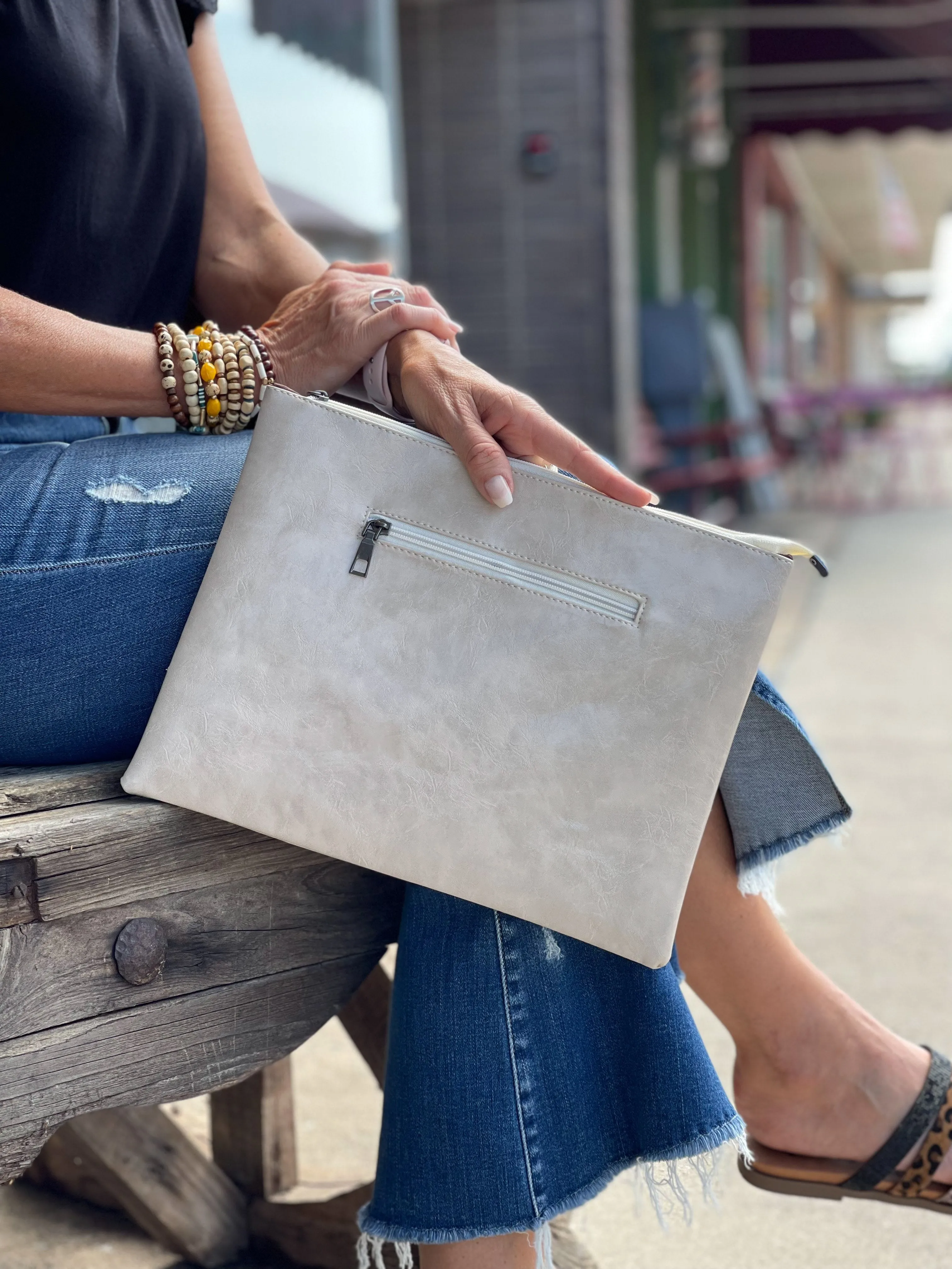 OVERSIZE CROSS STUDDED CLUTCH