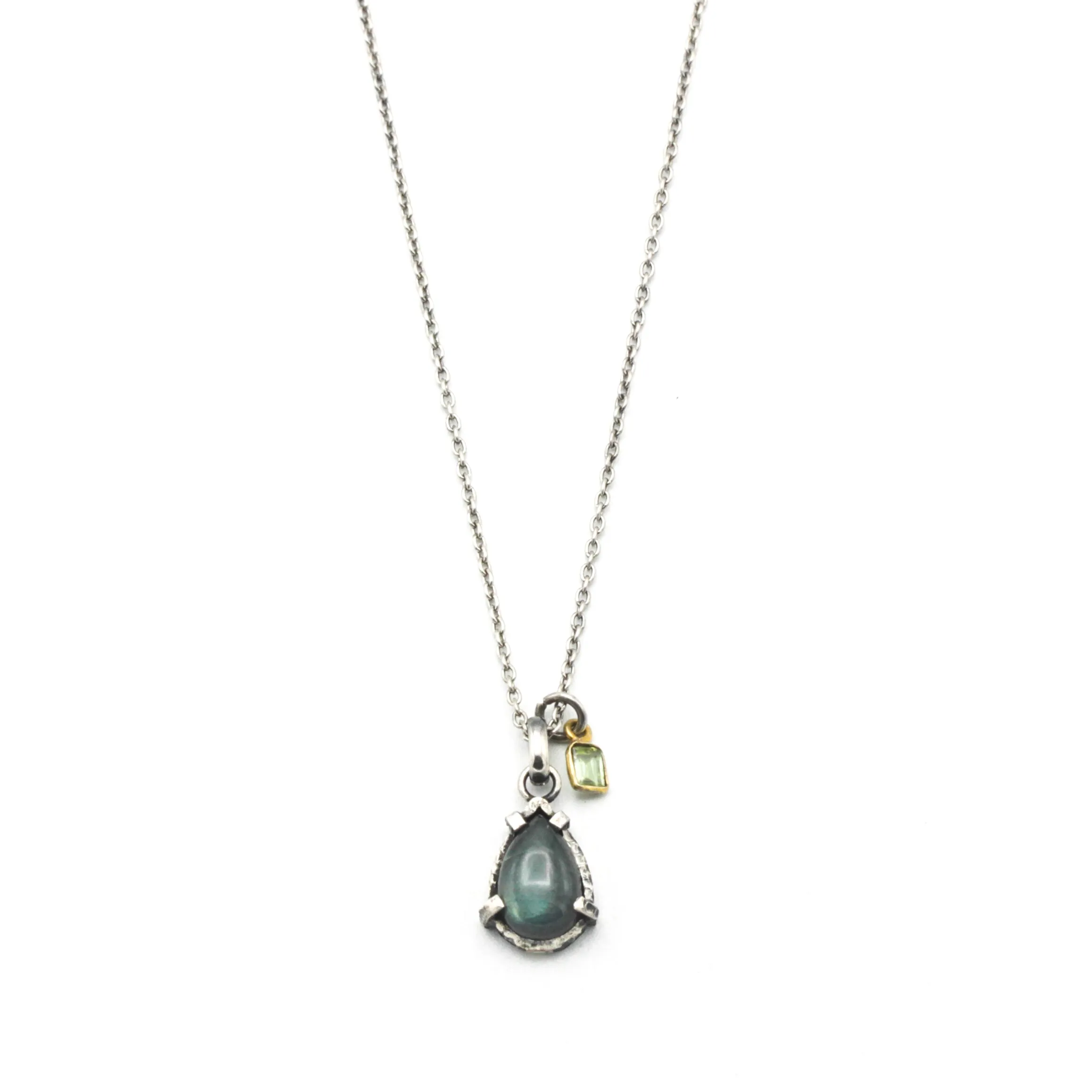 Tiny teardrop cabochon labradorite pendant necklace in silver bezel and prongs setting with green tourmaline gemstone